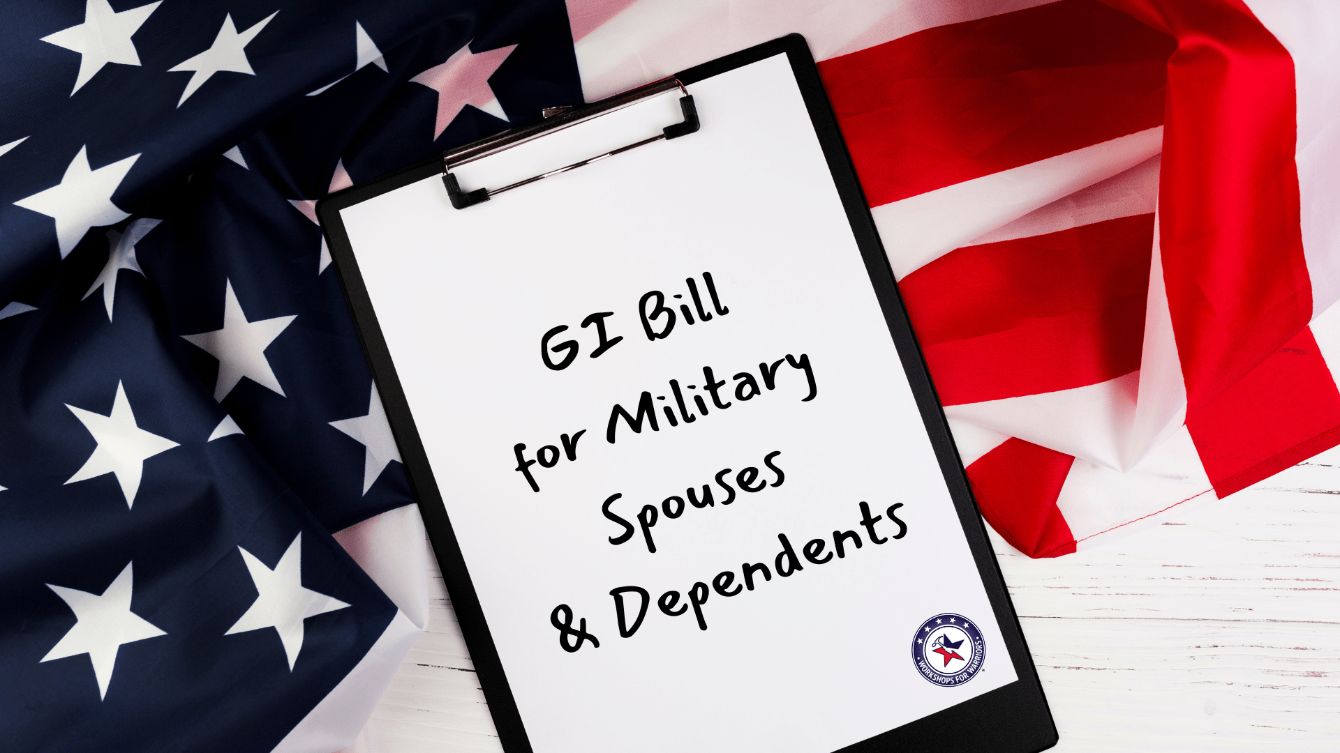 Clipboard on American flag that says GI Bill for Military Spouses and Dependents