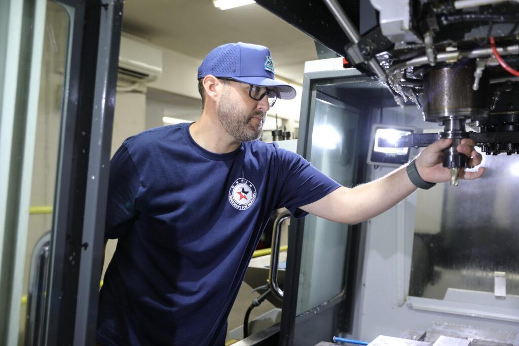 Navy veteran learning machining during transition from military to civilian life